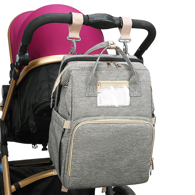 Grey color baby diaper backpack with bed