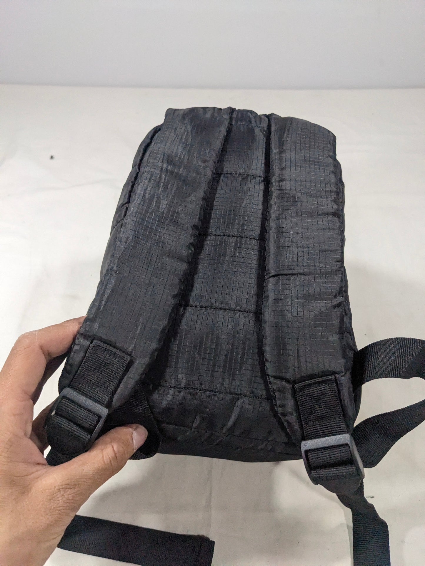 Mini black color backpack for accessories