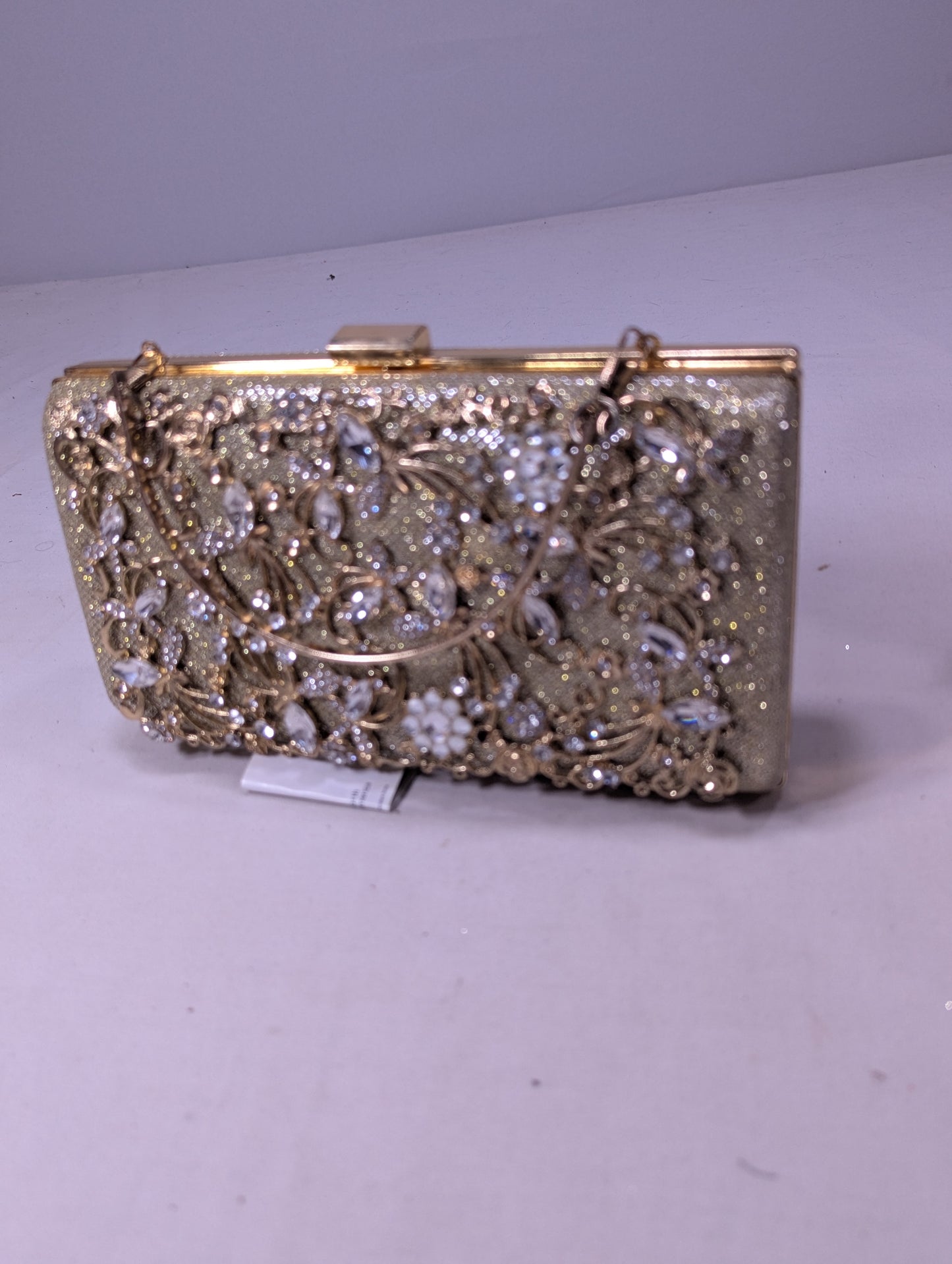 Clutch bag with golden work U2
