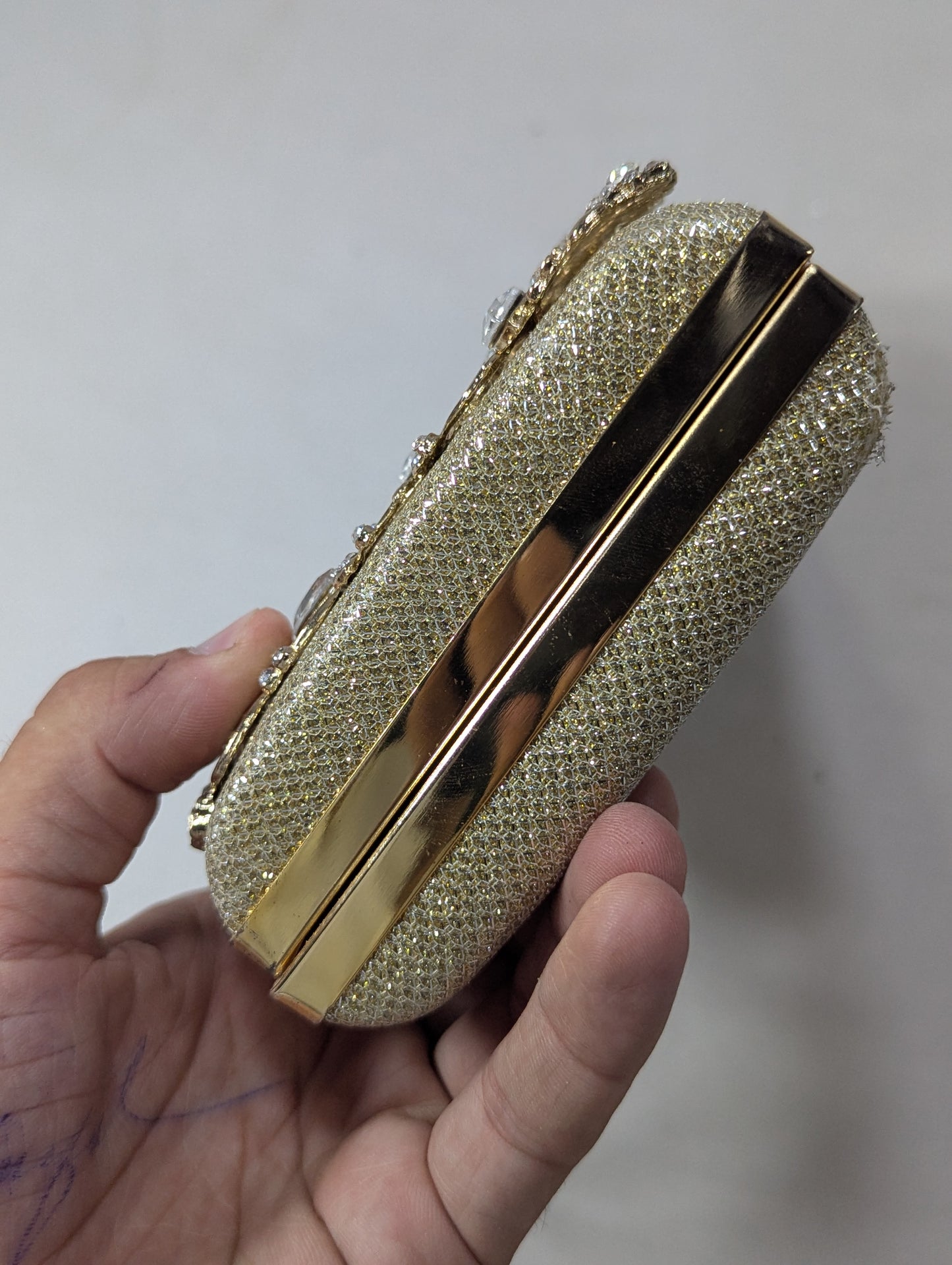 Clutch bag with golden work U2