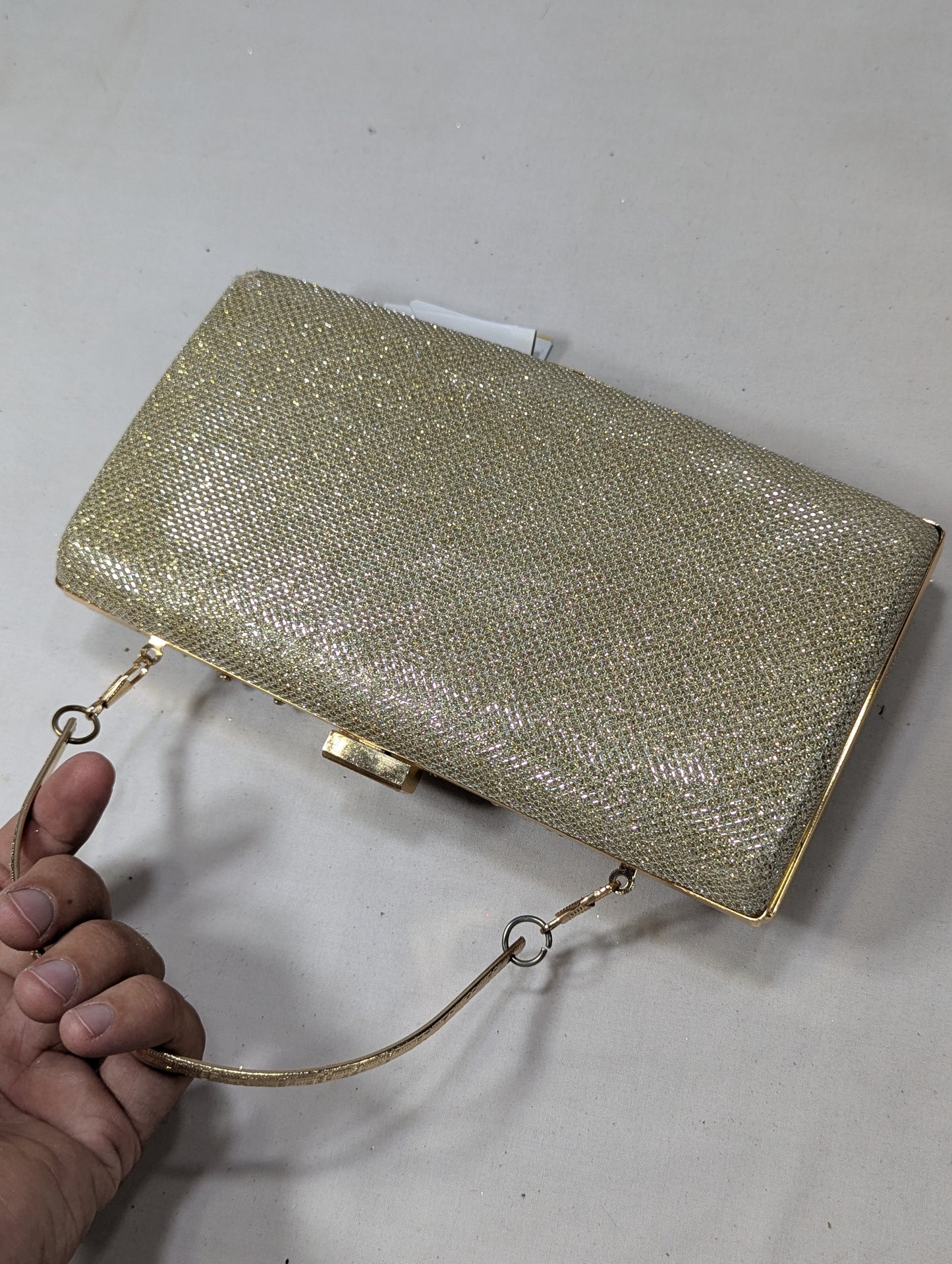 Clutch bag with golden work U2