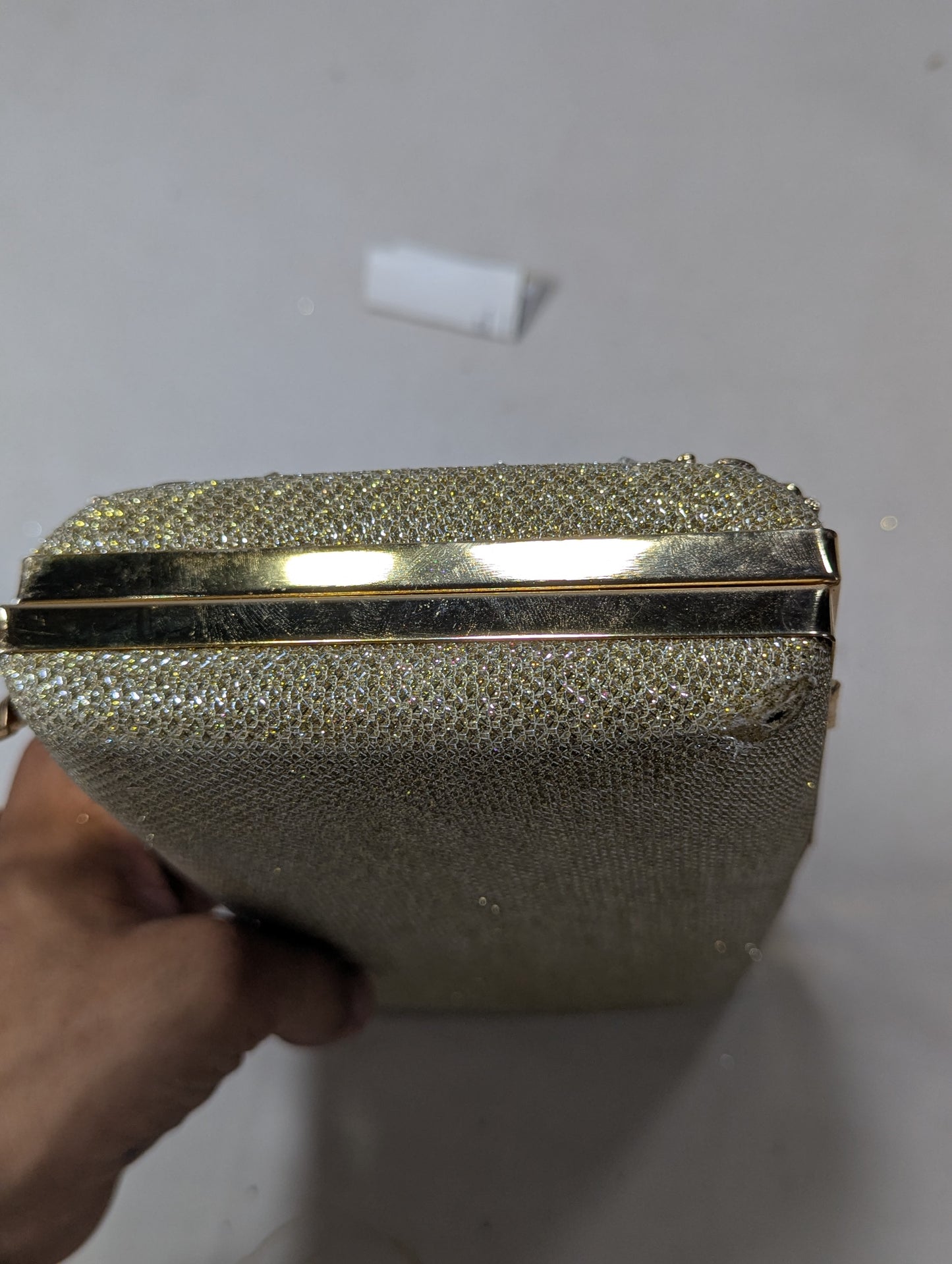 Clutch bag with golden work U2