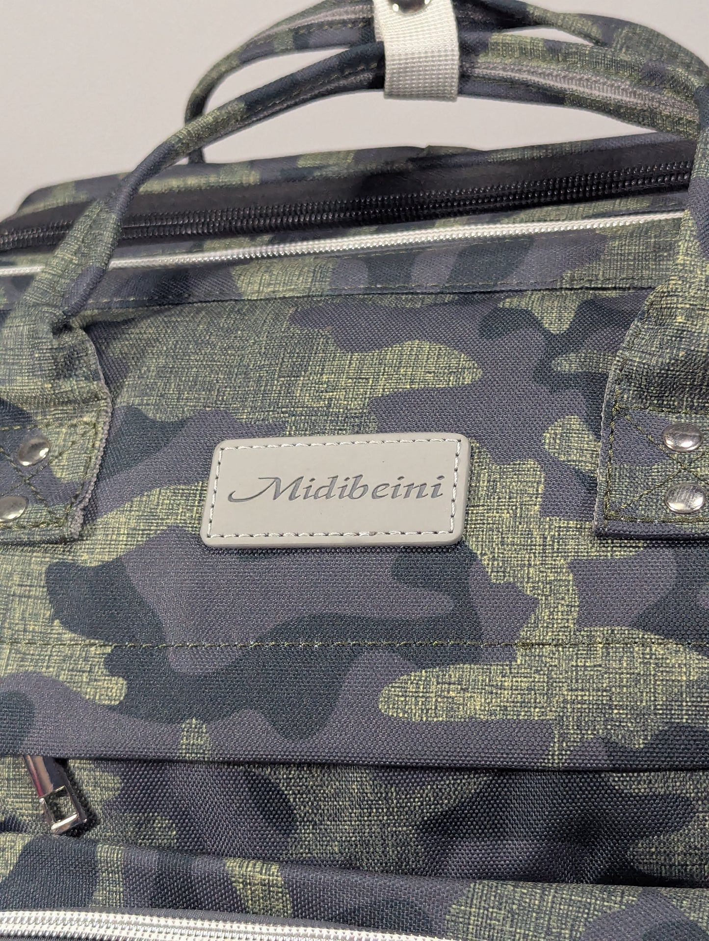 Camouflage baby diaper backpack with Baby bed