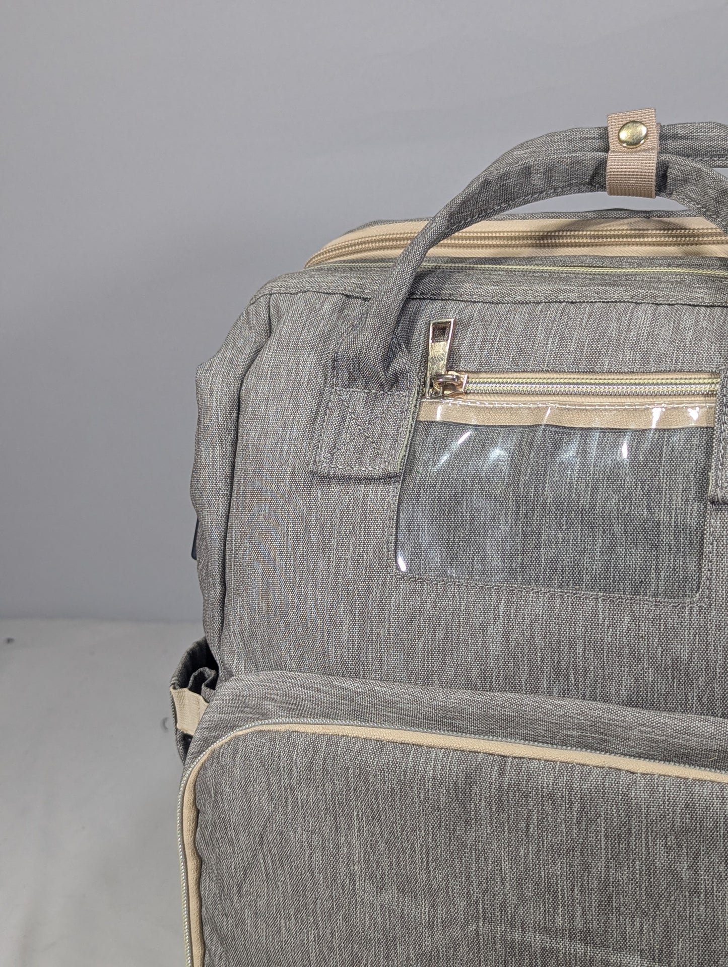 Grey color baby diaper backpack with bed