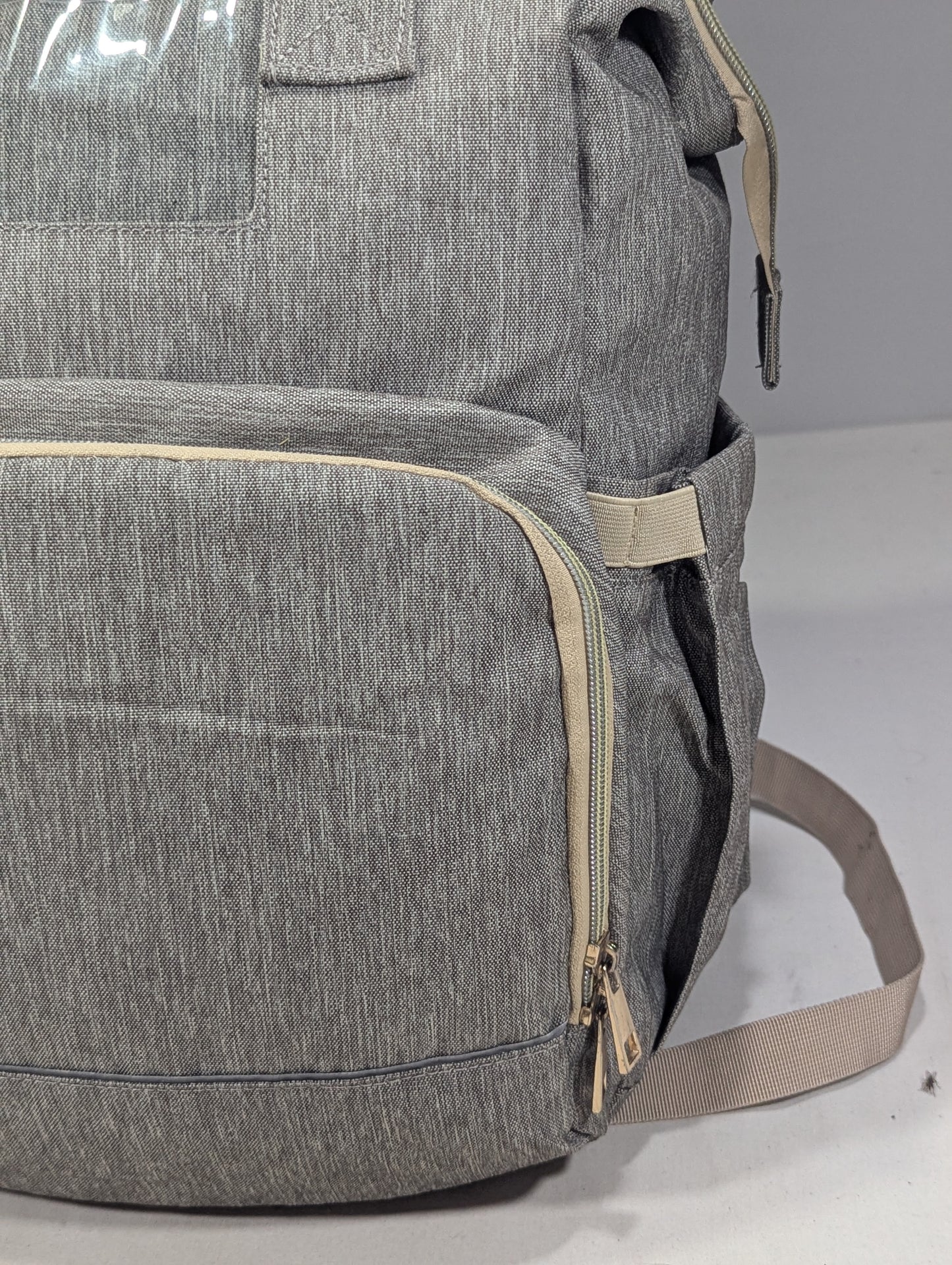 Grey color baby diaper backpack with bed