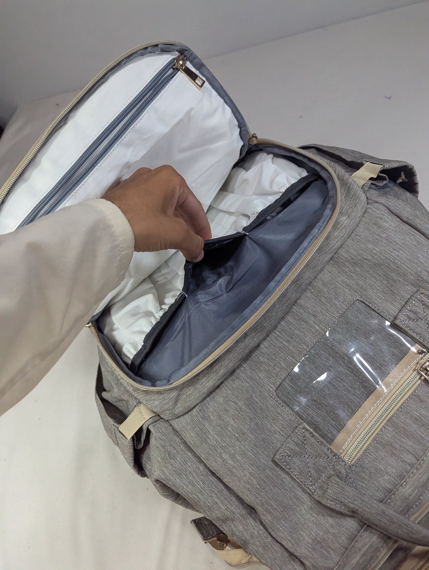 Grey color baby diaper backpack with bed