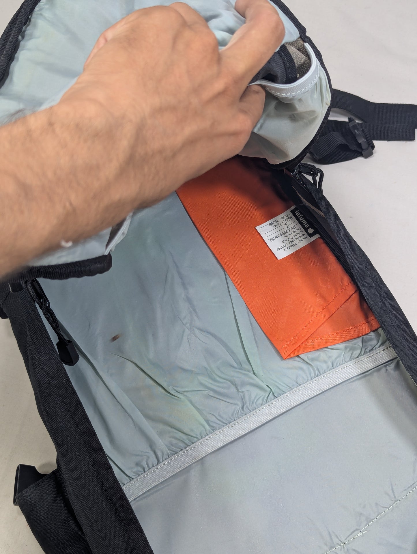 Tracking slim hiking tourist backpack
