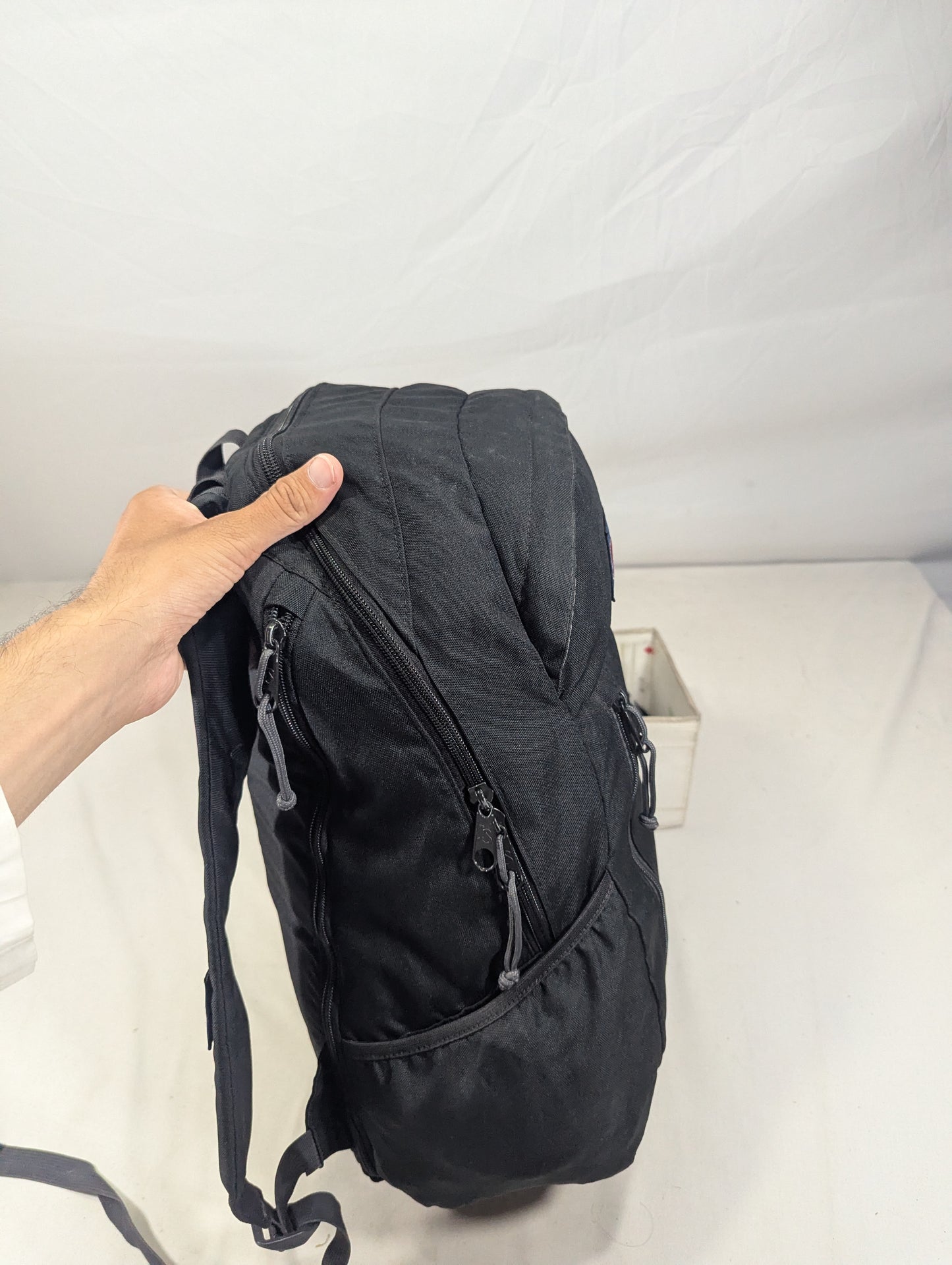 Jan sport black color backpack