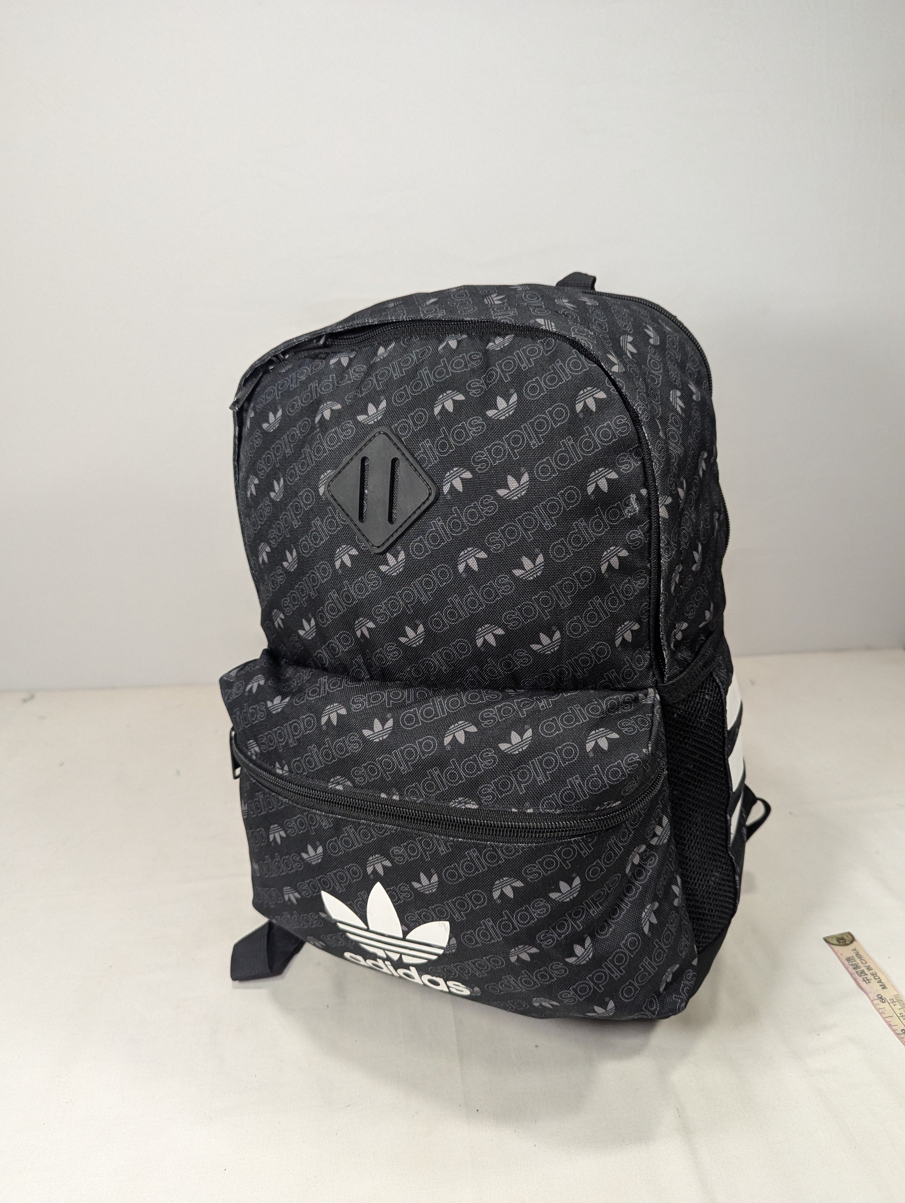 Adidas flower pattern black color backpack  U3