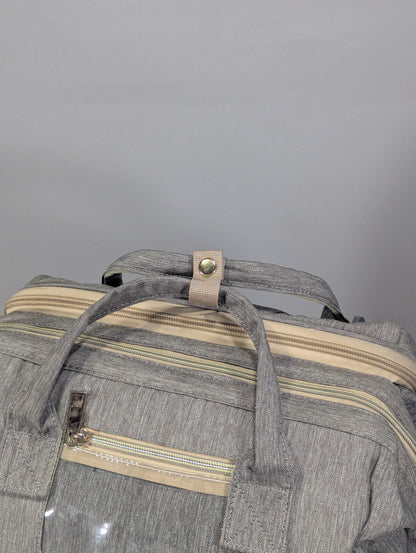 Grey color baby diaper backpack with bed