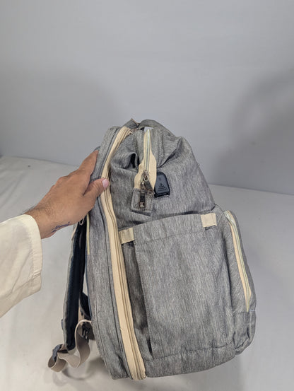 Grey color baby diaper backpack with bed