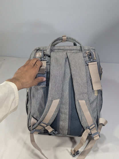 Grey color baby diaper backpack with bed