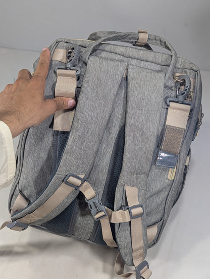 Grey color baby diaper backpack with bed