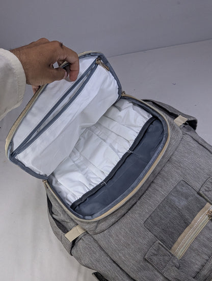 Grey color baby diaper backpack with bed