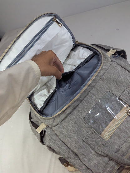 Grey color baby diaper backpack with bed