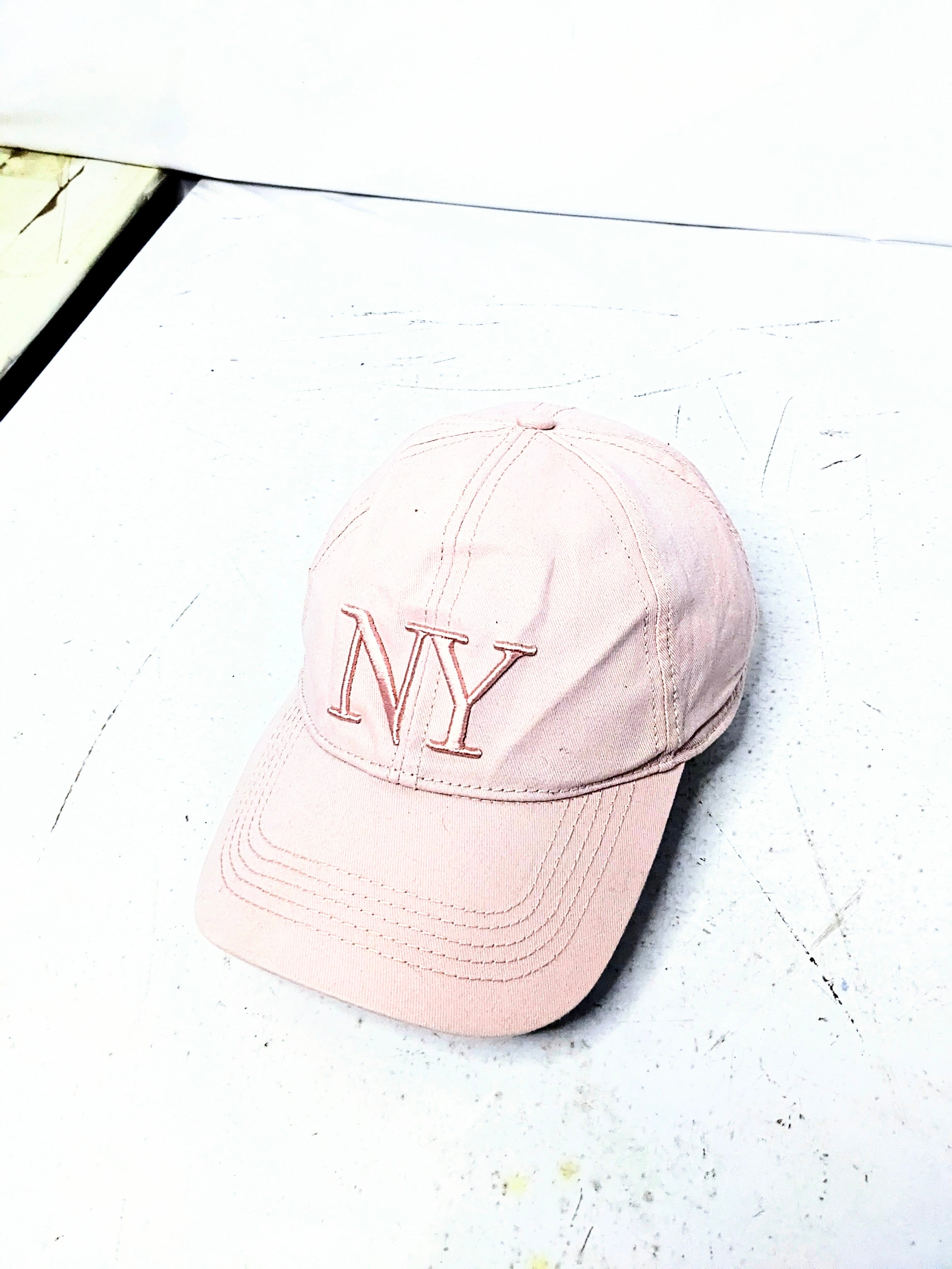 NY cap